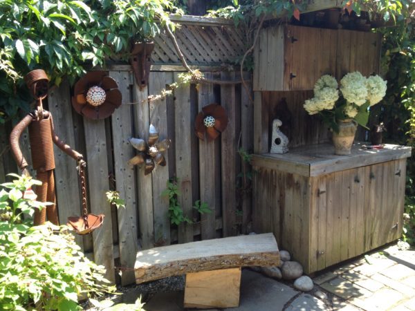 This garden was full of art, containers and bird baths made by one of the homewoners, from reclaimed materials.