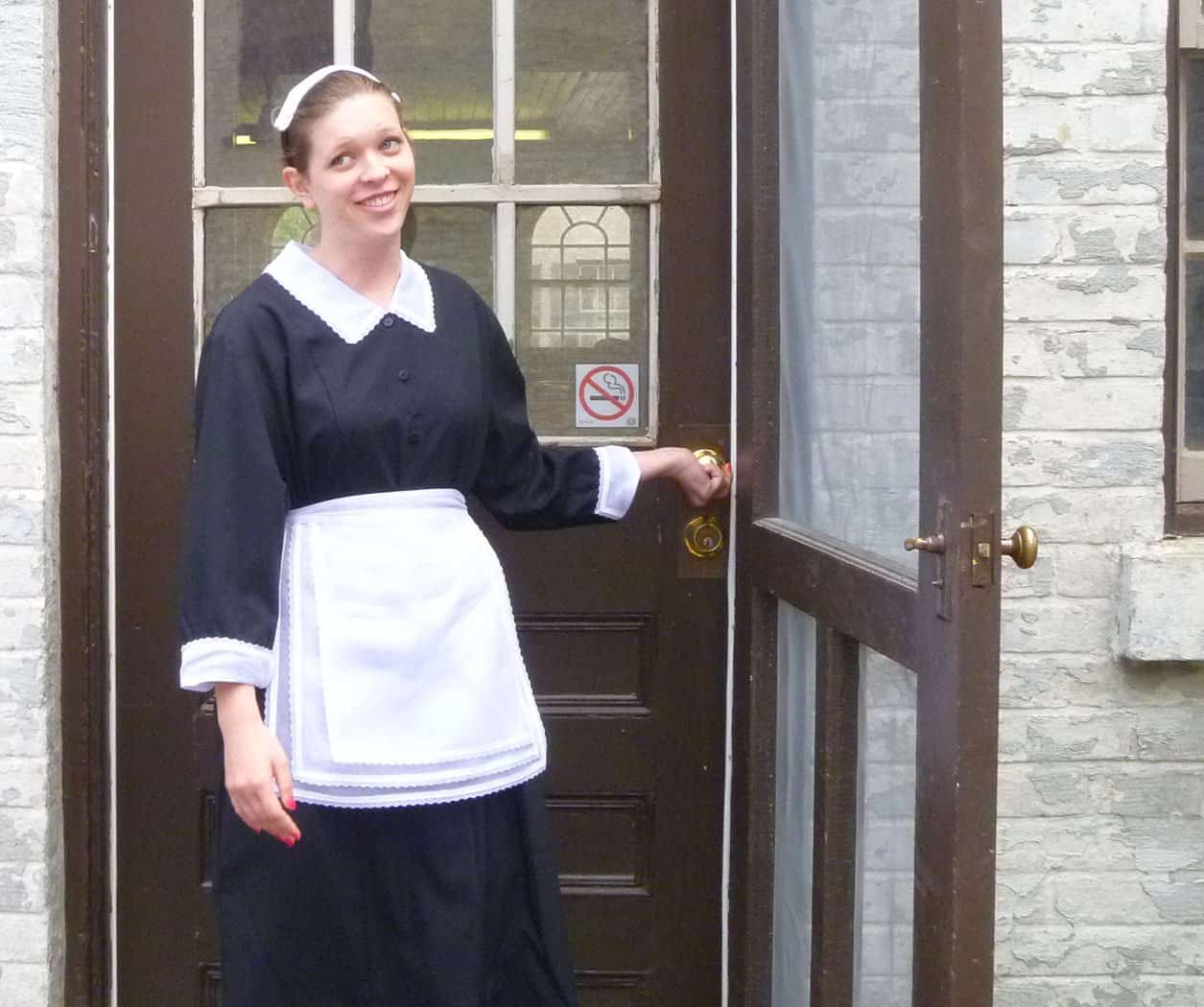 Jessie the maid quickly showed the new gardeners to the back door!