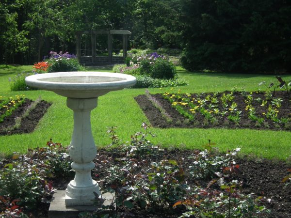 A birdbath was one of three elements King used in all his landscapes, along with a sundial and a flag.