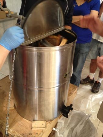 Four frames full of honey are slotted in the extractor, which is manually spun so the honey flows out into the filters. The TBG’s honey usually ends up being Grade 2 (as Liz Hood, director of education, says: “No bee legs.”)
