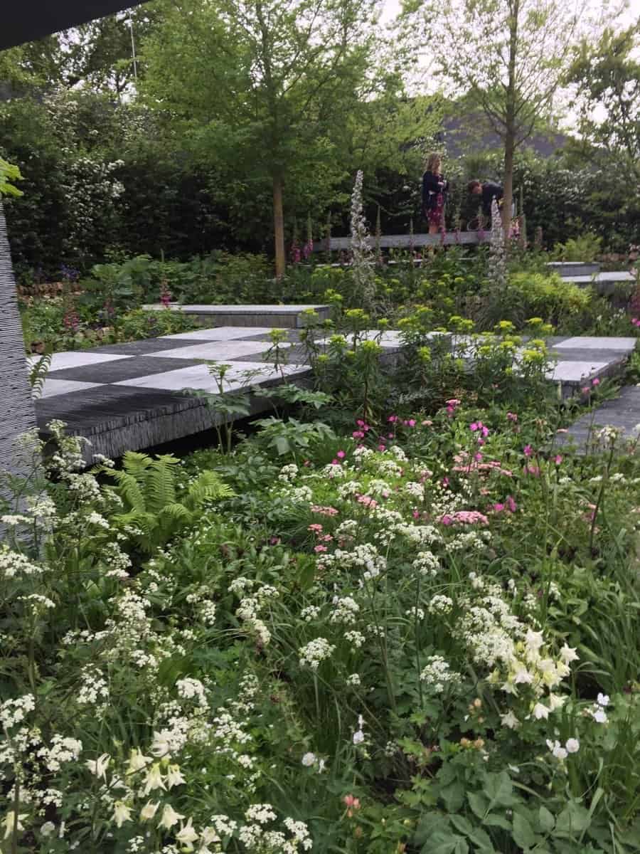 An estimated 40,000 squares of slate were used for this walkway. Lesson learned: Bold hardscaping looks best surrounded by subtle plantings.